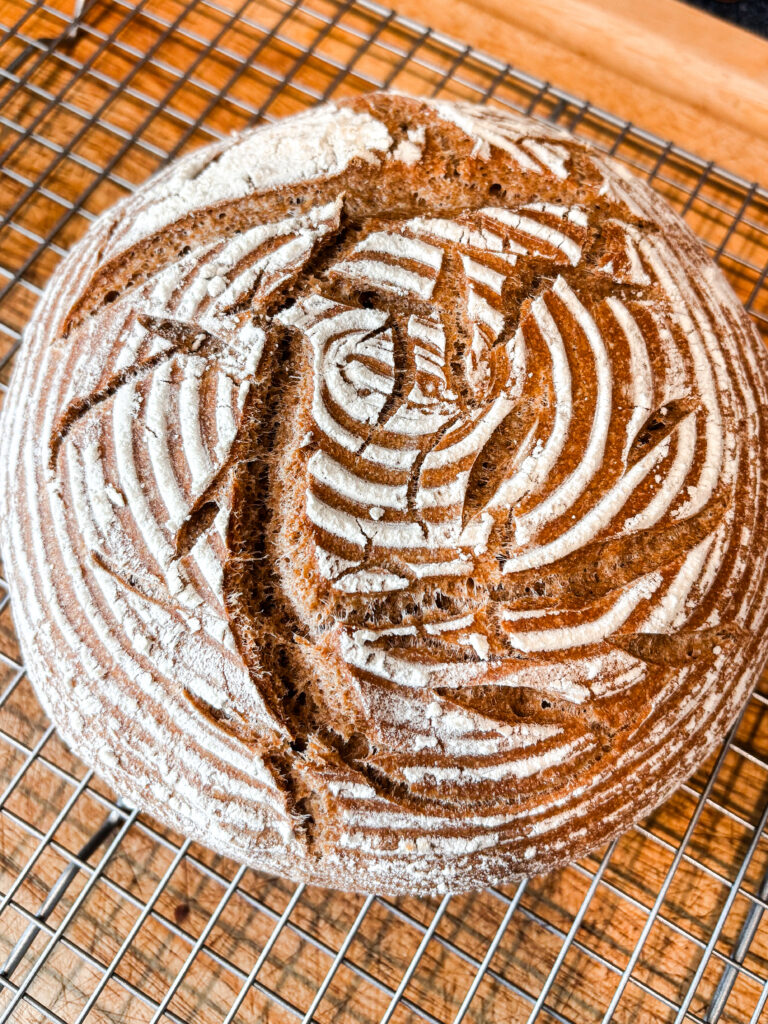 Sourdough loaf on wire rack